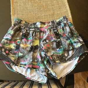 Lululemon hotty hot shorts size 8   4 inch inseam mid to low rise. Multi color